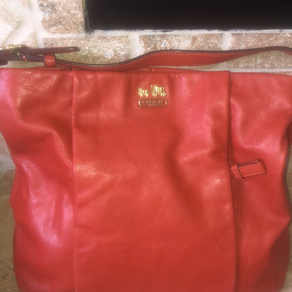 Coach leather Pumpkin color